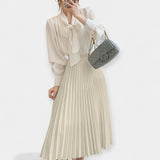 Gonna di raso plissettata lunga