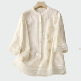 T-shirt in cotone con fiori ricamati