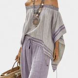 Top in bambù a righe, con spalle scoperte e pantaloni larghi per uno stile elegante e fresco