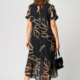 Abito Leggero con Disegni Lineari e Scollatura a V