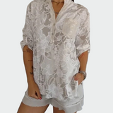 Blusa con motivo floreale