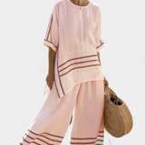 Salopette a righe larghe e taglio asimmetrico - stile moderno e comodo