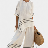 Salopette a righe larghe e taglio asimmetrico - stile moderno e comodo