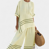 Salopette a righe larghe e taglio asimmetrico - stile moderno e comodo