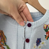 Sahara | Elegante cardigan con fiori