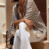 Camicia a Righe dallo Stile Raffinato