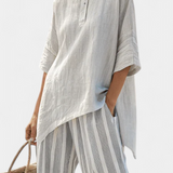 Completo Daisy con Maglietta Asimmetrica e Pantaloni a Righe per uno Stile Moderno ed Elegante